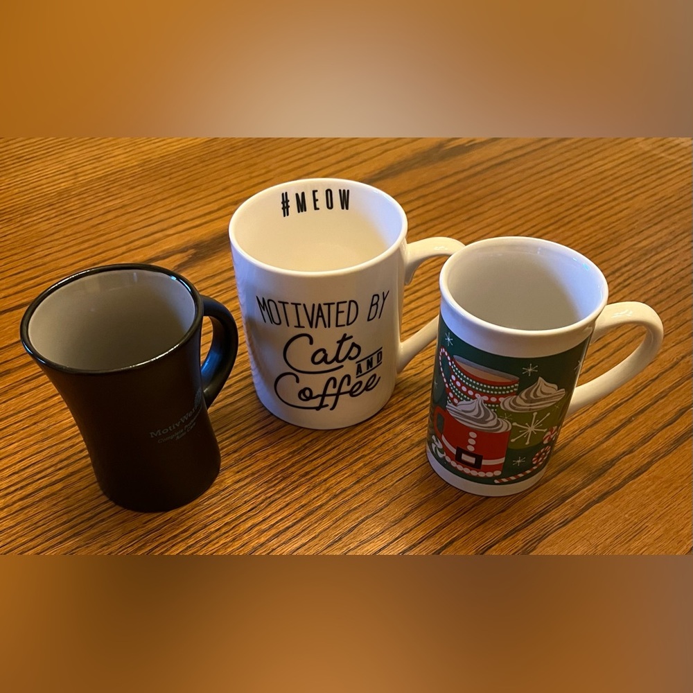 Three Ceramic Mugs and Hot Plate